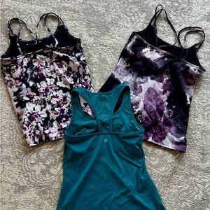 Three medium sized Gaiam yoga/work out tank tops